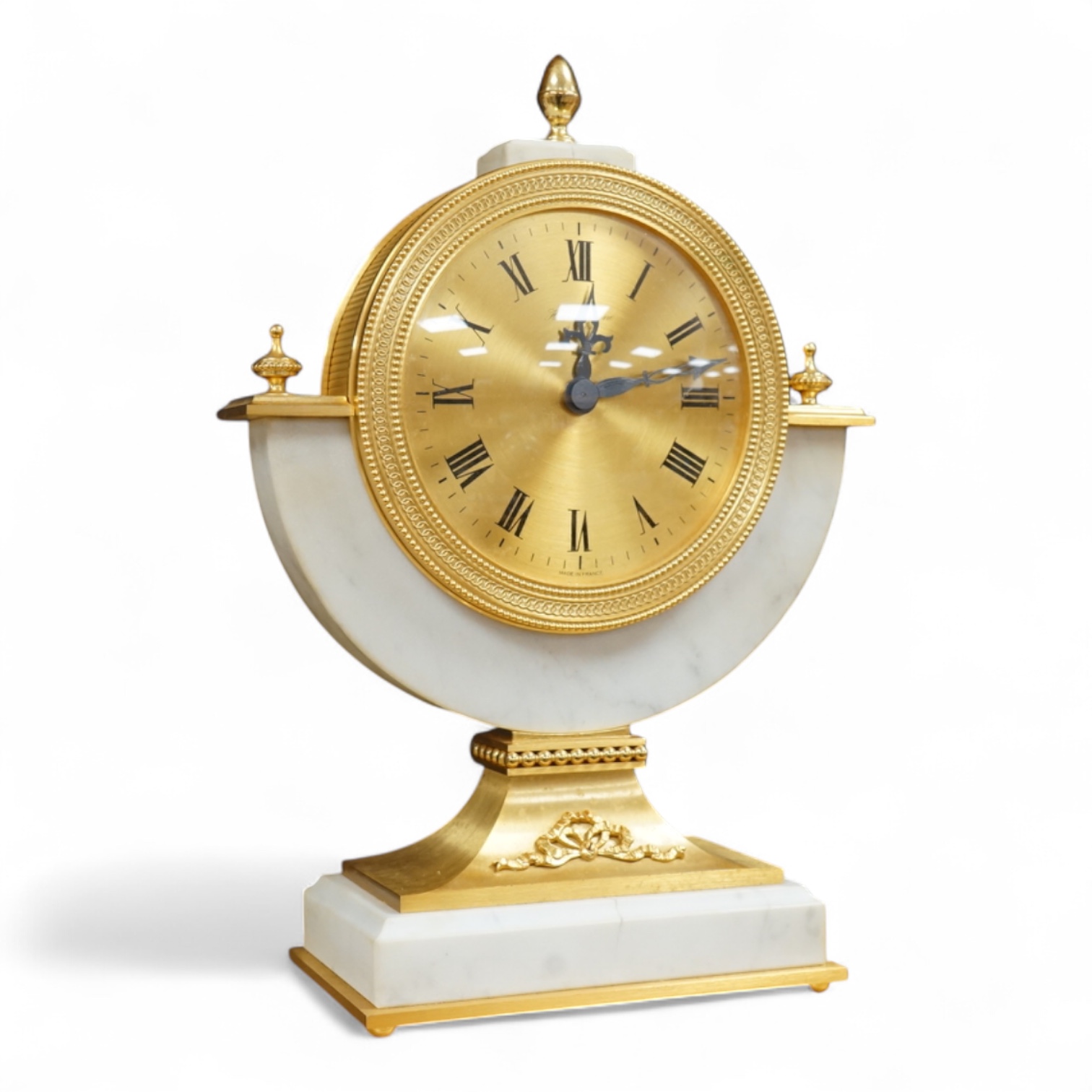 A 1970's Hour Lavigne white marble and gilt bronze mantle timepiece, boxed, 29cm high